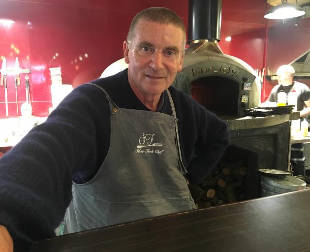Feeling right at home in the Paulina's kitchen is Russell Garbutt. Photo: Adam Burns