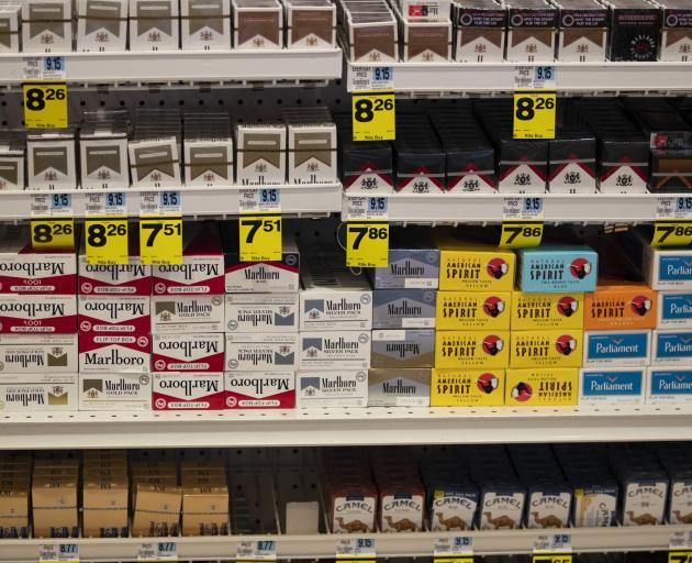 Cigarettes are displayed on store shelves in Beverly Hills. Photo: AP 