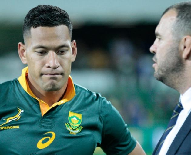Israel Folau, pictured wearing a Springboks jersey, with coach Michael Cheika. Photo: Getty Images 