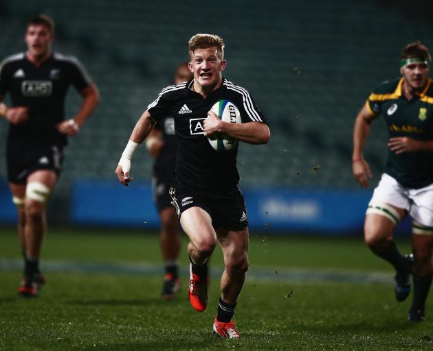 Damien Mackenzie was a breakout star at the 2014 junior World Champions in Auckland. Photo: Getty...