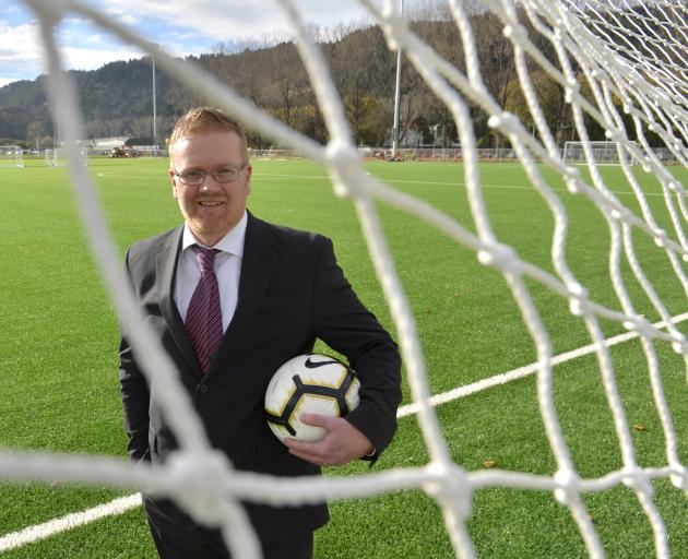 Former Football South chairman Matthew Holdridge at the new artificial turf at Logan Park...