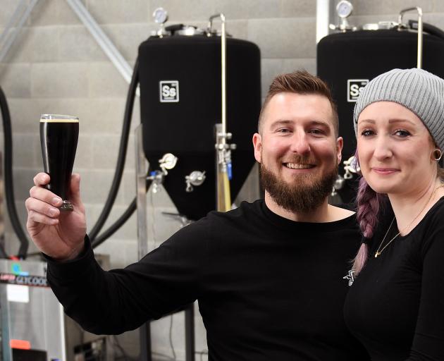 Partners Chris Noye and Sarah Williams in their craft brewery which uses local ingredients. PHOTO...