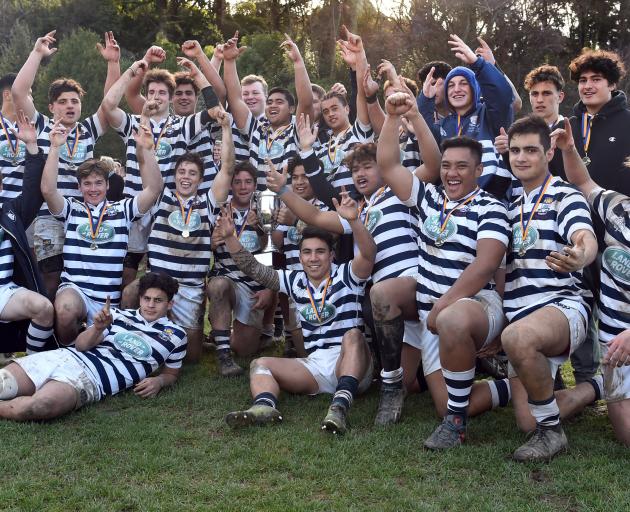 The Otago Boys’ High School first XV is all smiles after winning on Saturday. Photo: Peter McIntosh