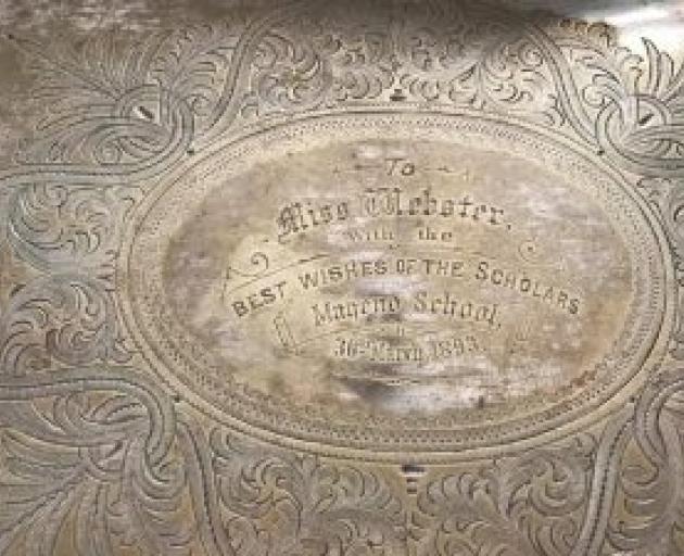 The tray is engraved: “to Miss Webster, with the best wishes of the scholars, Maheno School”.