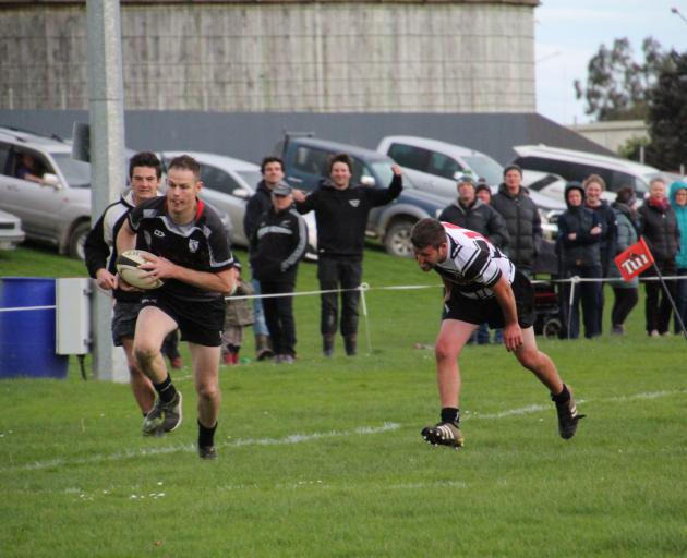 Edendale winger Phil Brown scores one of his three tries against Riversdale at Edendale on...