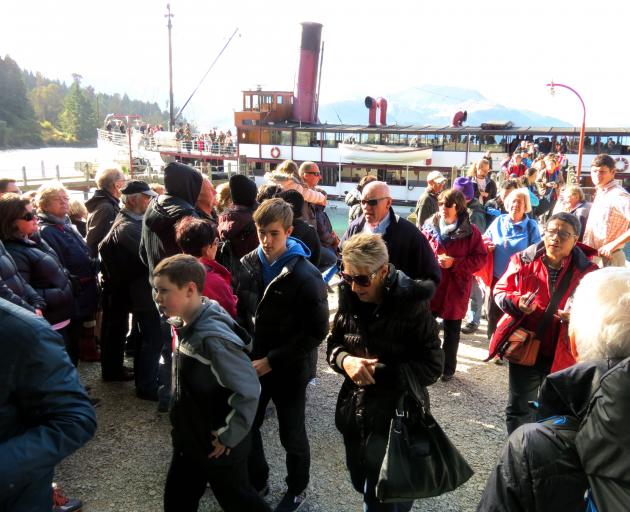 Visitors wait to board the ever-popular Earnslaw, as a load disembarks. Photo: ODT