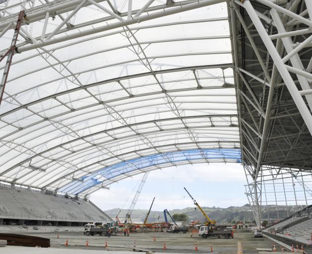 The covered stadium’s roof takes shape in late 2010. PHOTO:GERARD O’BRIEN