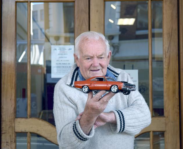 New Zealand Model Vehicle Club secretary Eric Brockie inspects a model 1970 Plymouth Road Runner at the Otago branch’s annual expo in Dunedin. PHOTO: SHAWN MCAVINUE
