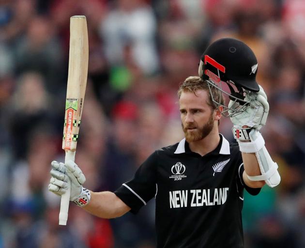 Black Caps skipper Kane Williamson salutes the crowd after bringing up his century in his side's...