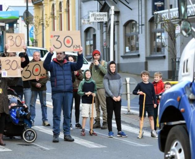 Protesters stopped trucks to make their point about the speed limit in Port Chalmers last week....