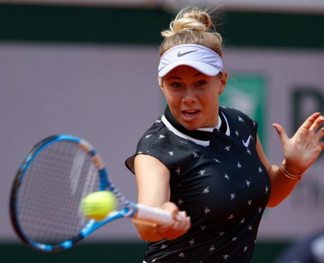 Amanda Anisimova plays a forehand during her win over Simona Halep at the French Open. Photo:...