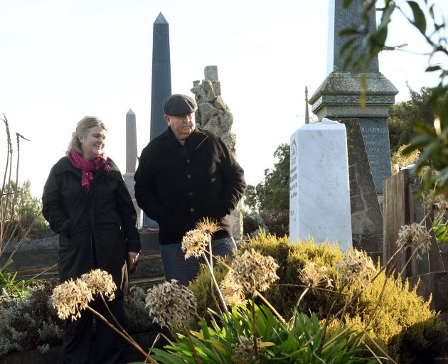 Dunedin woman Deirdre Cooper and her father Peter Duncan with the marble headstone of Mr Duncan’s...