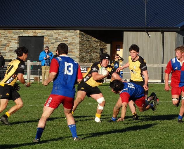 Upper Clutha hooker Joe Cairns sets off on a run against Maniototo, at Wanaka on Saturday....