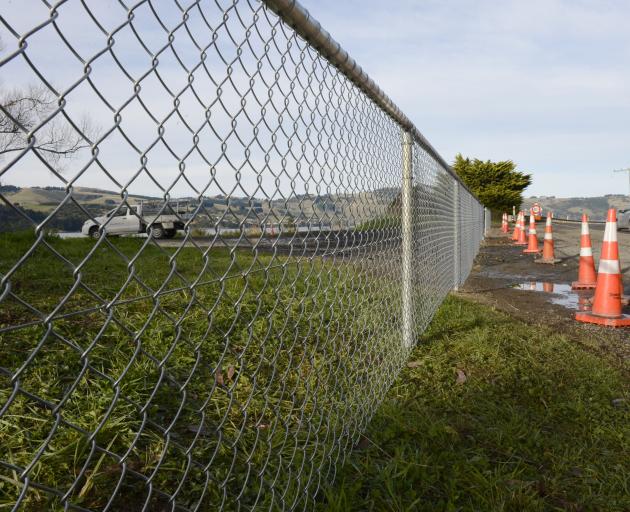 An "ugly" new fence to stop illegal rubbish dumping at Curles Point, near St Leonards, will annoy...