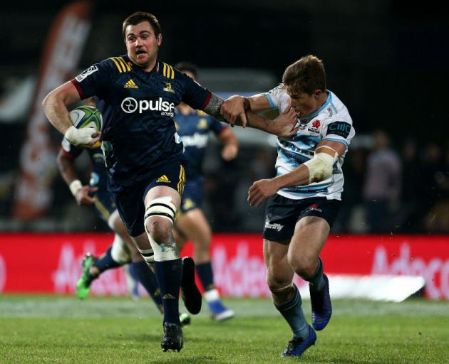 Liam Squire on the run for the Highlanders against the Waratahs in Invercargill tonight. Photo:...