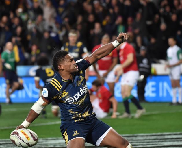 Waisake Naholo celebrates scoring for the Highlanders against the British and Irish Lions at Forsyth Barr Stadium in 2017. Photo: Peter McIntosh
