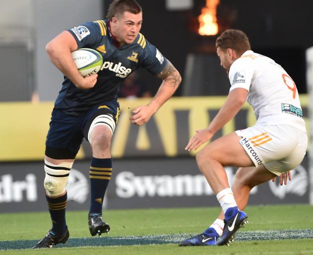 Liam Squire on the run for the Highlanders. Photo: Getty Images