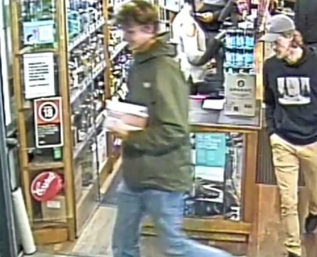 CCTV footage released by Australian police of missing Belgian backpacker Theo Hayez (right, hat,...