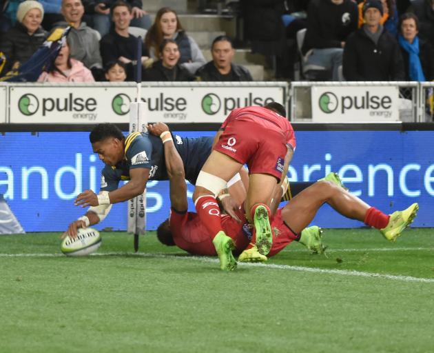 Naholo is tackled by Damian McKenzie during a match against the Chiefs in 2017. Photo: Gregor Richardson