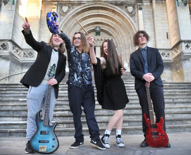 Velvet Strings band members (from left) Seth Fleming (15), Max White (15), Jayda Smither (14) and...