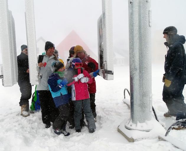 First to scan their tickets and ride the chondola on the opening day of the Cardrona Alpine...