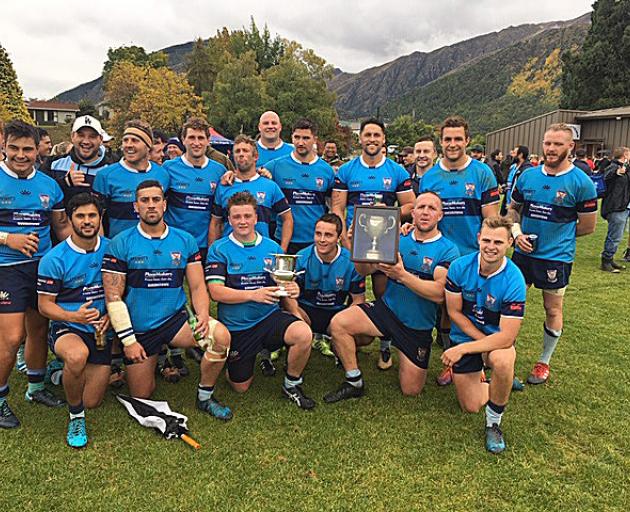 The Wakatipu players celebrate with the White Horse Cup after beating Arrowtown 20-19 at Jack...