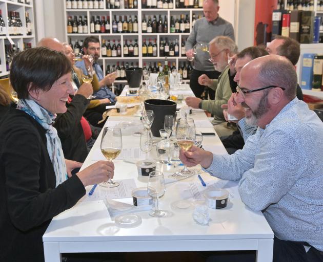 Sue Clarke and Andy Kilsby (foreground) enjoy a wine/oyster matching seminar at Wine Freedom in Dunedin at the end of last month. Photos: Linda Robertson