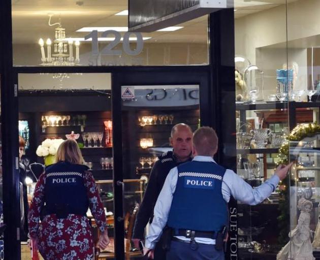 Police at Sue Todd Antiques following a robbery at the store last week. Photo ODT 