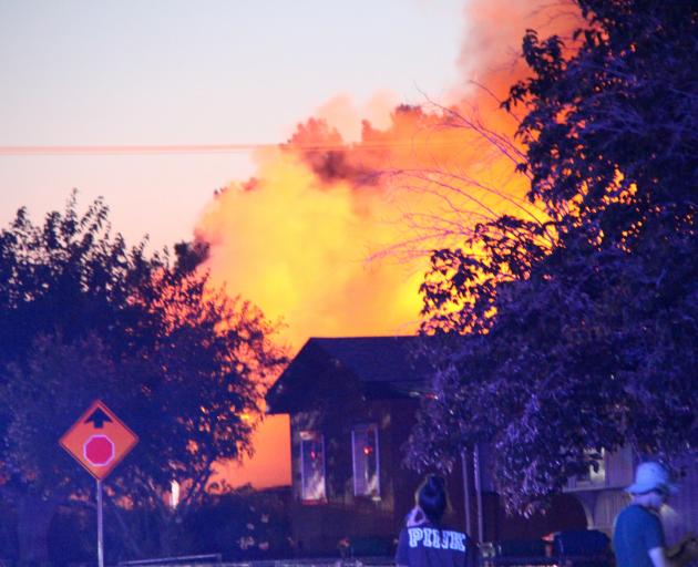 A house burns after gas lines broke during the earthquake in Ridgecrest, California. Photo: via...