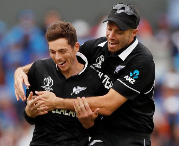 New Zealand's Mitchell Santner celebrates taking the wicket of India's Rishabh Pant. Photo: Reuters