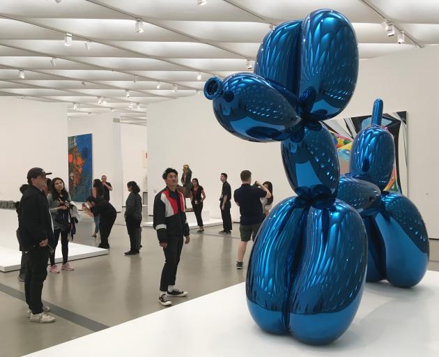 Jeff Koons' "Balloon Dog (Blue)" takes pride of place in The Broad contemporary art museum, in downtown Los Angeles. Photo: Pam Jones