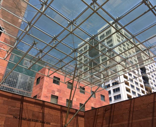 A glimpse of Los Angeles cityscape is seen from the courtyard outside the Museum of Contemporary Art, in downtown LA. Photo: Pam Jones