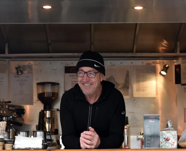 Classic Cafe owner Chris Baker keeps the beans fresh for passengers at the bus hub. Photo: Peter McIntosh