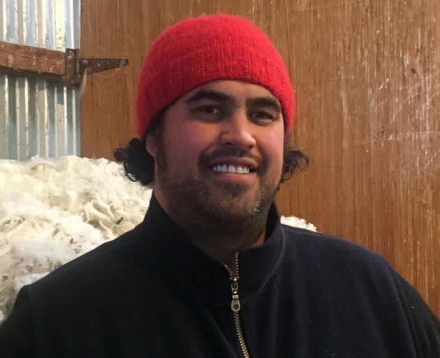 Shearing trainer and contractor Chas Tohiariki takes a break during a fine wool shearing and wool...