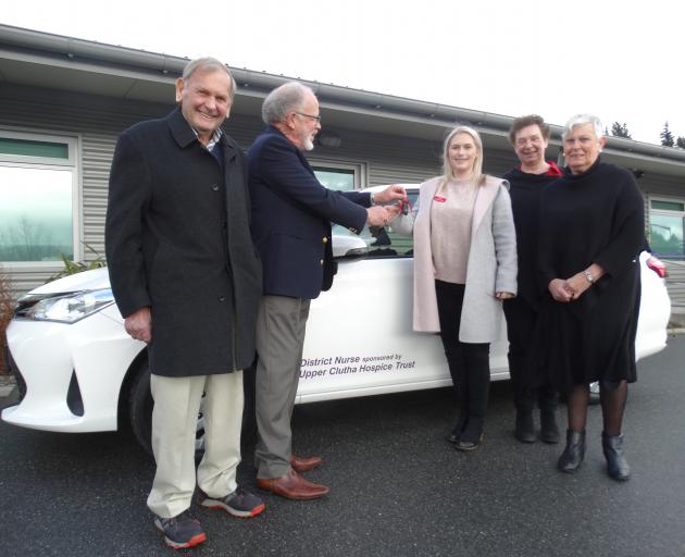 Celebrating the handover of keys for a new vehicle to help deliver palliative services in the Upper Clutha are (from left) Upper Clutha Hospice Trust trustee Neville Dippie, trust chairman Russell McGeorge, Central Otago Health Services Ltd (Cohsl) distri