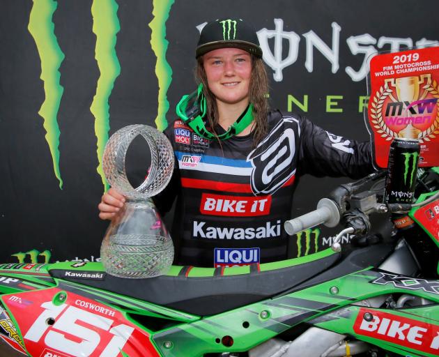 Palmerston rider Courtney Duncan, her Kawasaki KX250F and the trophies she won in the Czech...