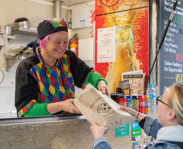 Anna Arndt dishes out fish and chips from a caravan in Queenstown. Photo: Supplied