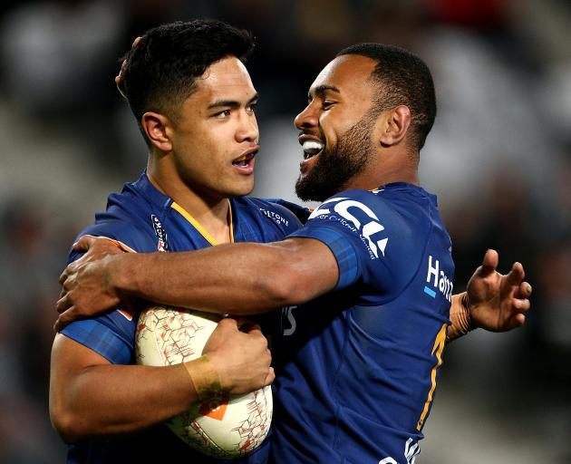 Josh Ioane is congratulated by Jona Nareki during the Mitre 10 Cup last season. Photo: Getty Images 