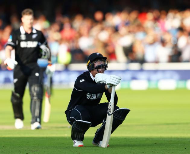 Martin Guptill reacts as he is run out on the final ball of the Super Over by Jos Buttler. Photo:...