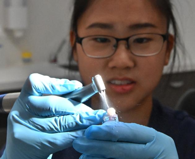 University of Otago student Helene Chua has been carrying out research on dental handpieces which could save dentists from investing in unnecessary, expensive equipment. Photo: Linda Robertson