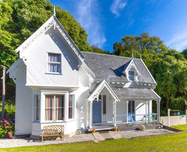 This historic Dunedin home was saved from demolition in the 1950s and moved, virtually board by...