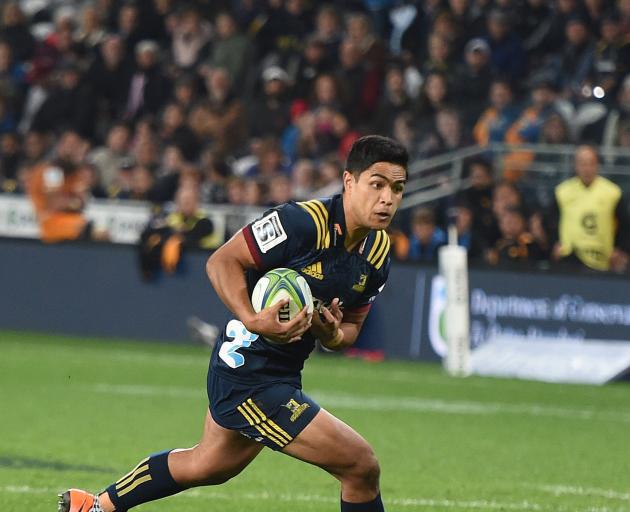 Highlanders first five-eighth Josh Ioane looks to take on the Jaguares defence at Forsyth Barr...