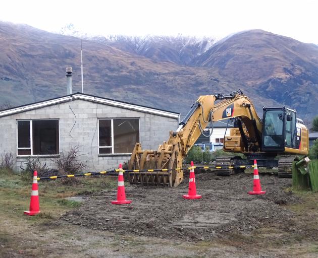 The Wanaka Primary School teacher’s residence moments before it was demolished. PHOTOS: KERRIE...