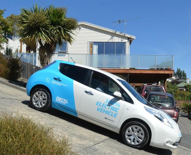 ODT reporter Damian George drives a 2014 Nissan Leaf electric vehicle down Baldwin St, Dunedin....