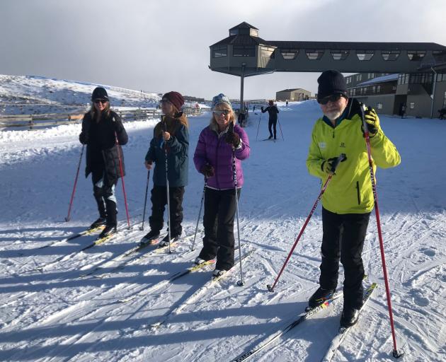 Enjoying the fresh snow at Snow Farm yesterday are (from left) Niki White, Lucille Anderson, Jane Watson Taylor, all of Wanaka, and instructor Herb Holden. Photo: Snow Farm
