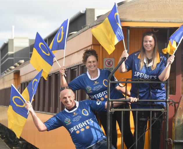 Getting ready for the train from Dunedin to the Ranfurly Shield challenge in Oamaru are (from left) Kevin and Jodie Byrne and Anna Oliver. Photo: Stephen Jaquiery