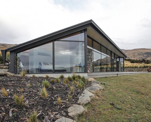 Exterior and interior (below) views of the "challenging build" in Cromwell that claimed Southern...