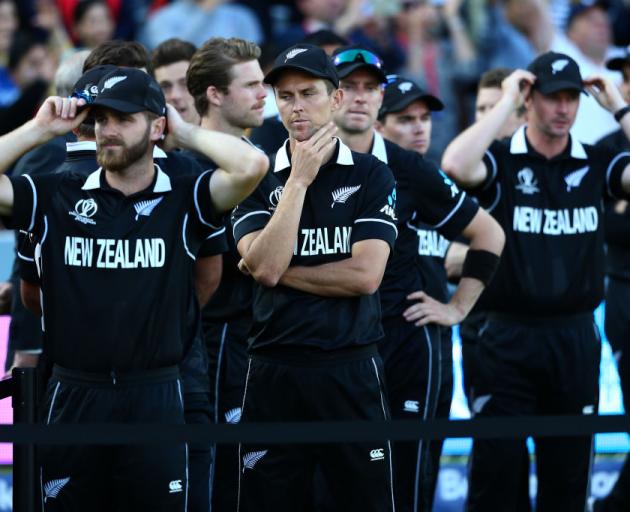 Trent Boult of New Zealand looks dejected following his side's defeat during in the Cricket World...