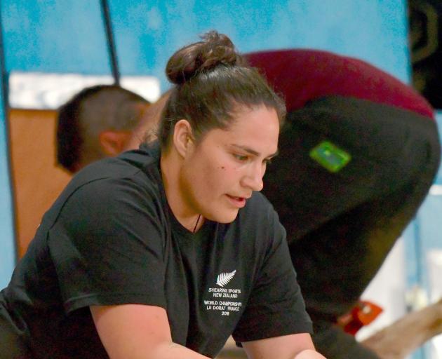 Alexandra woolhandler and shearer Pagan Karauria in action at the Golden Shears World Shearing...