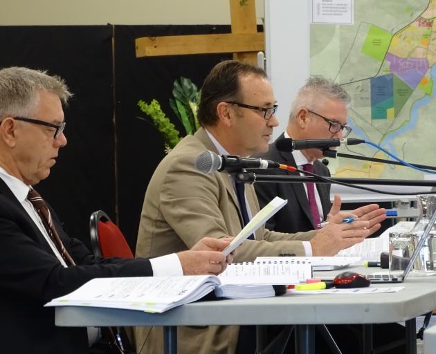 Commissioners (from left) Gavin Lister, Gary Rae (chairman) and David McMahon hearing evidence at...